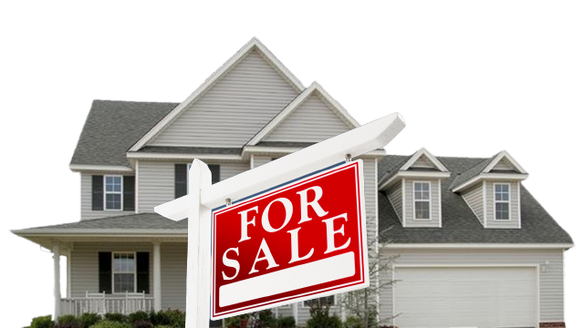 A large two-story house with grey siding, white trim, 
				        and multiple gables is displayed in the background. In front of the house is a prominent red and white 'For Sale' sign, 
				        indicating the property is available for purchase.